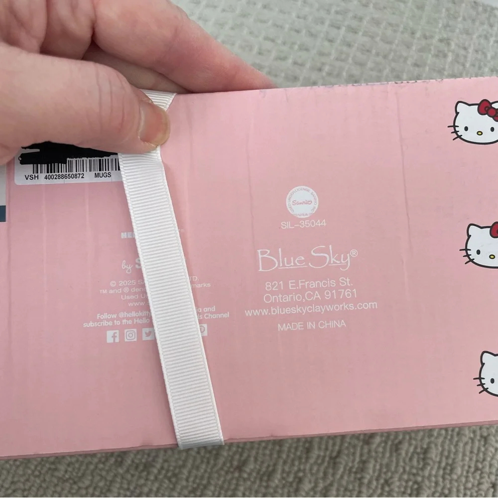 NIB hello kitty mug and figurine set